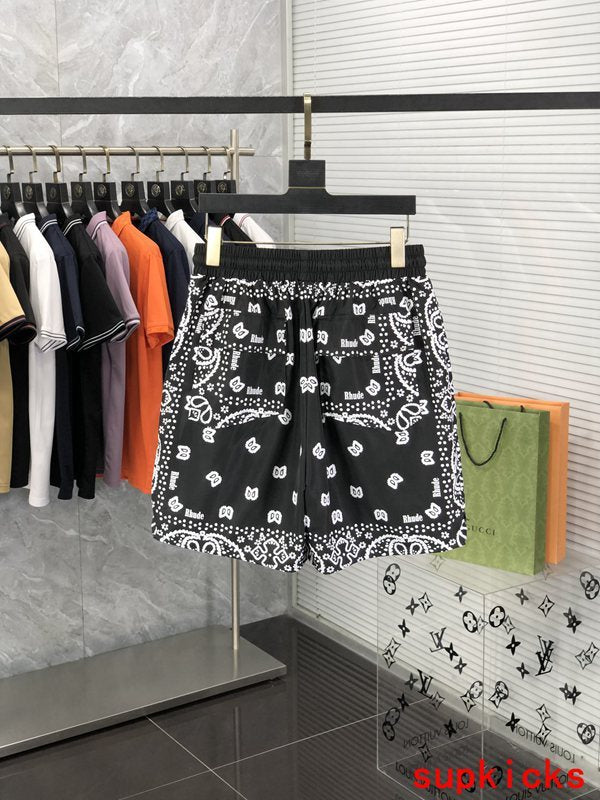 Side profile of Rhude luxury clothing with label-forward styling