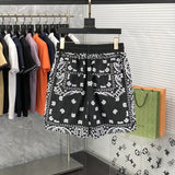 Side profile of Rhude luxury clothing with label-forward styling