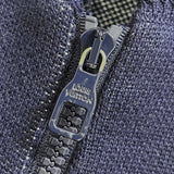 Flat lay presentation of Louis Vuitton luxury clothing with monogram-inspired silhouette