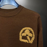 Back view of Louis Vuitton luxury clothing with streetwear-inspired cut