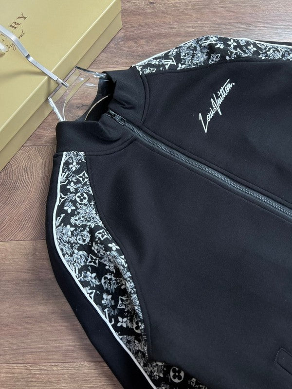 Close-up detail shot of Louis Vuitton luxury clothing with label-forward styling
