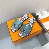Hermès Chocolate Brown Flat Thong Sandals - Angled View