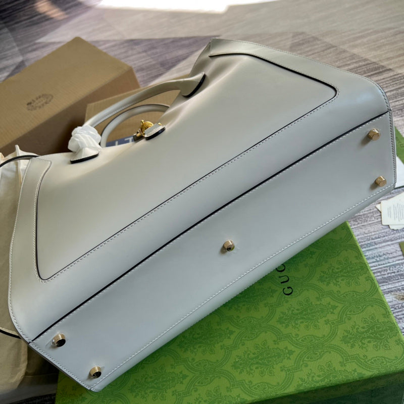 Styled lifestyle shot of chic structured women's handbag – women's premium purse