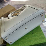 Styled lifestyle shot of chic structured women's handbag – women's premium purse
