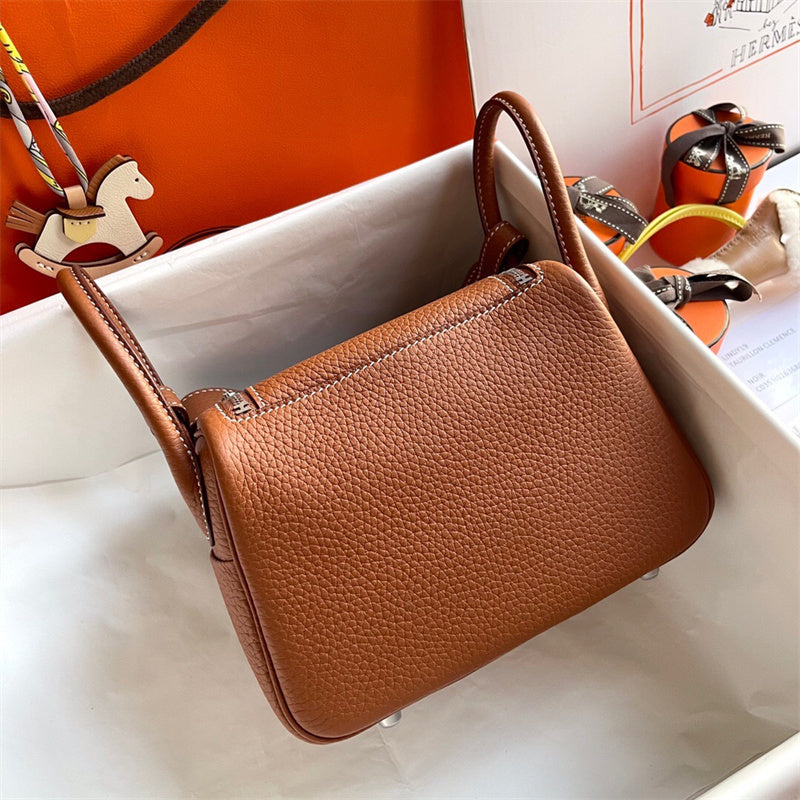  clean-lined handbag styled with outfit