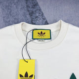 Close-up detail shot of Gucci luxury clothing with signature branding