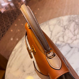 Side view of minimalist structured handbag