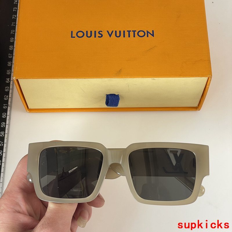 Lifestyle view of Louis Vuitton unisex sunglasses