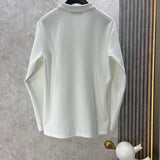 Side profile of Louis Vuitton luxury clothing with logo-detail design