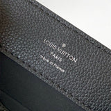  signature crossbody bag detail view showing craftsmanship