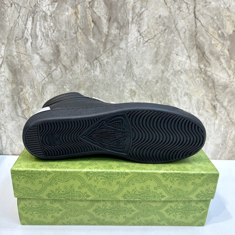 Side profile of Gucci tonal black sneakers bold athletic profile