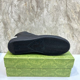 Side profile of Gucci tonal black sneakers bold athletic profile