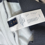 Front view of Louis Vuitton luxury clothing with label-forward styling