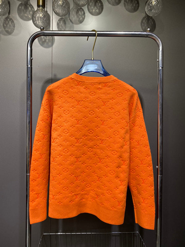 Flat lay presentation of Louis Vuitton luxury clothing with streetwear-inspired cut