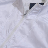 Back view of Louis Vuitton luxury clothing with label-forward styling