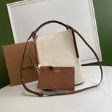 Ziva's Charm handbag – side angle view (one versatile size)