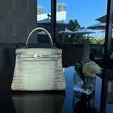 Side view of modern structured handbag