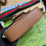 Styled lifestyle shot of signature modern women's handbag – women's statement bag