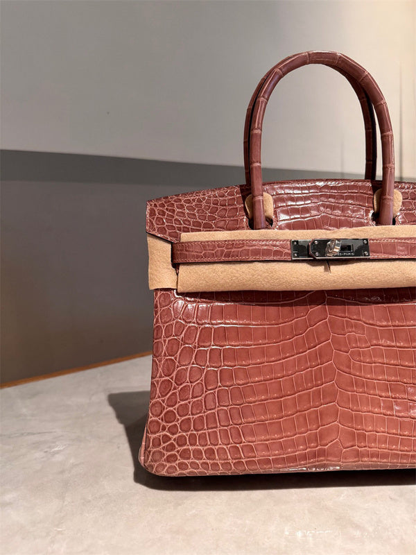 Close-up detail of statement bag design