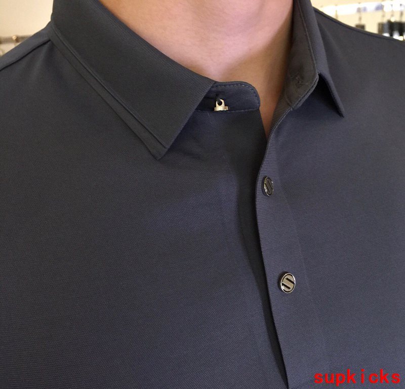 Close-up detail shot of Moncler luxury clothing with contemporary cut
