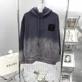 Close-up detail shot of Louis Vuitton luxury clothing with relaxed-fit cut
