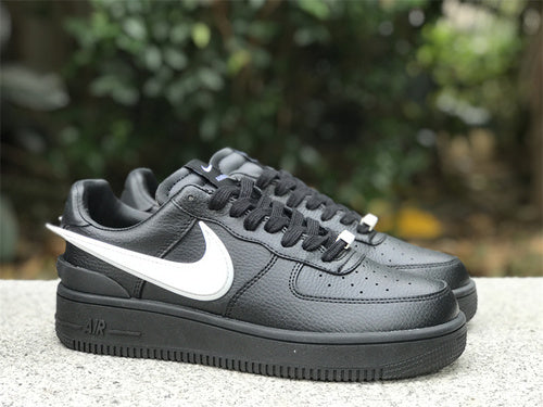 Nike Designer sneakers in fresh white-and-black signature lace-up style front view