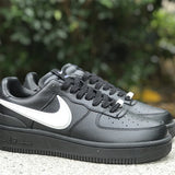 Nike Designer sneakers in fresh white-and-black signature lace-up style front view