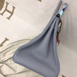 Side view of refined structured handbag