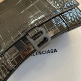Styled lifestyle shot of signature polished women's handbag – women's premium purse