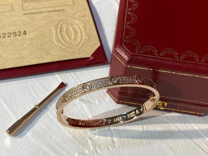 Side view of Cartier unisex jewelry piece