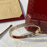 Side view of Cartier unisex jewelry piece