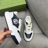 Side profile of Gucci two-tone sneakers sleek tonal finish