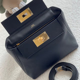 Side view of sophisticated structured handbag