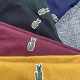 Full styled look of Lacoste luxury clothing with logo-detail design