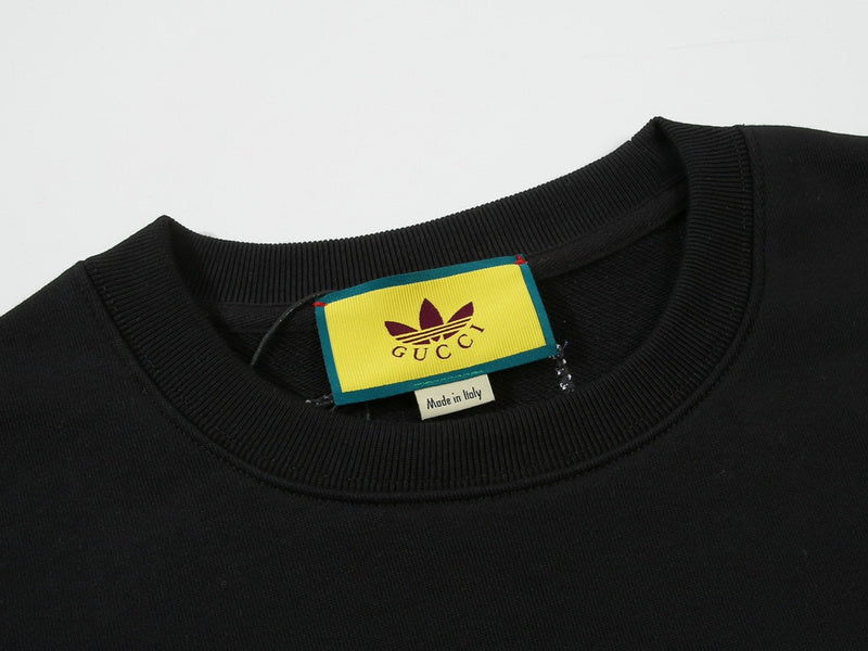 Close-up detail shot of Gucci luxury clothing with streetwear-inspired cut