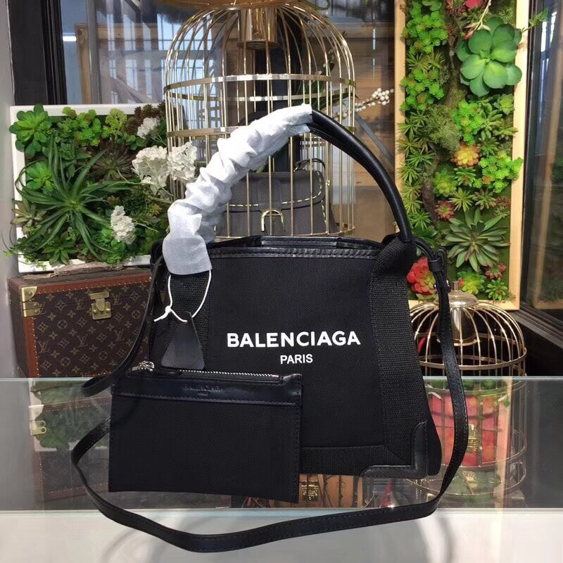 Polished Faux Leather Handbag - Understated Luxury Look | Women's Premium Handbag #952 - side angle view (image 2) of designer-inspired handbag