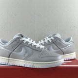 Side profile of Nike fresh white-and-black sneakers streetwear statement look