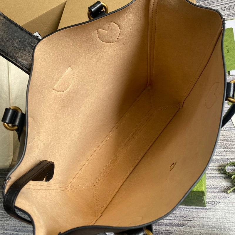 Side profile of classic elevated women's handbag – women's luxury handbag