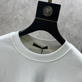 Full styled look of Louis Vuitton luxury clothing with logo-detail design