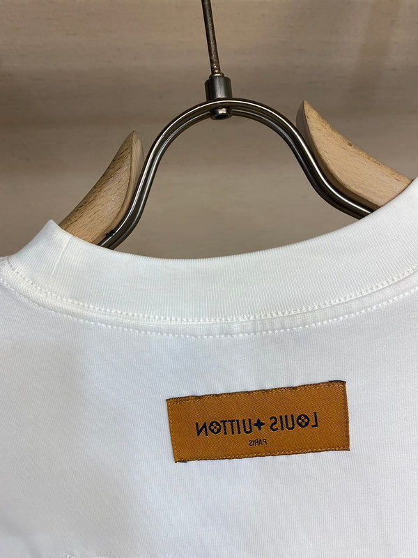 Side profile of Louis Vuitton luxury clothing with runway-inspired design