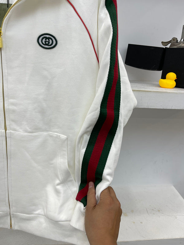 Side profile of Gucci luxury clothing with label-forward styling