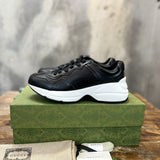 Gucci crisp white luxury sneakers view 10 retro runner design