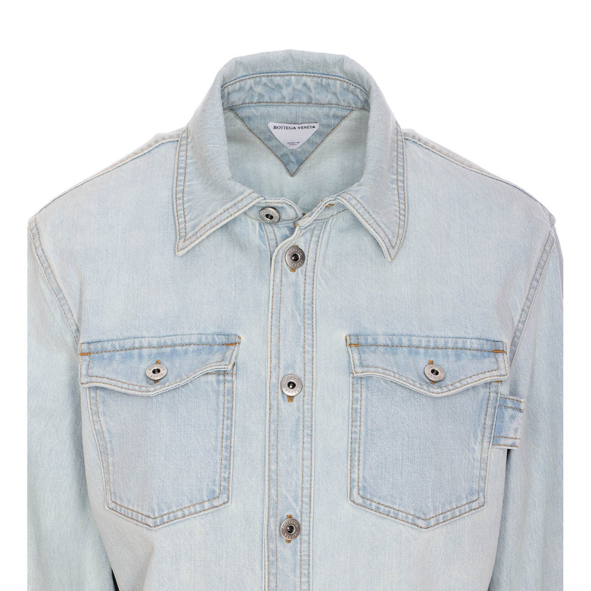 Close-up of Bottega Veneta tee shirts hardware and fine stitching