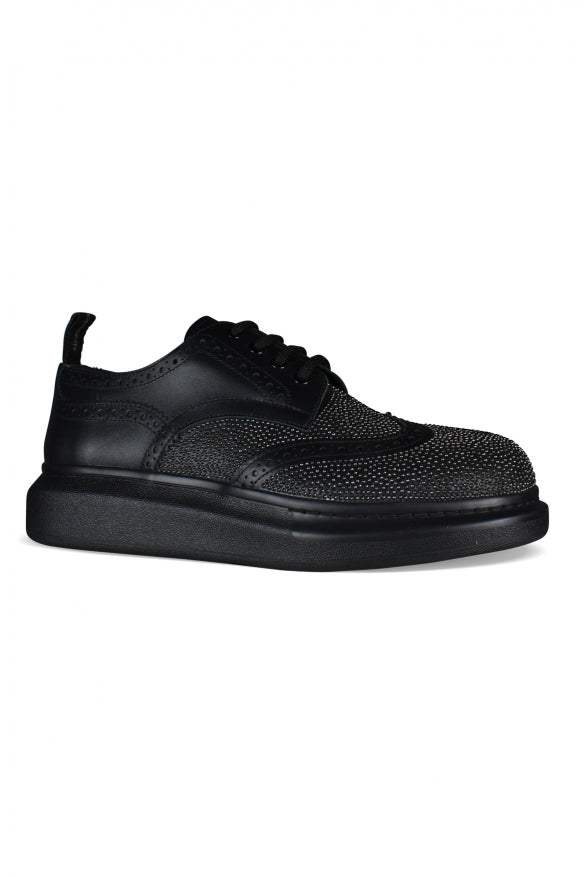 Alexander McQueen premium athletic detail and craftsmanship close-up
