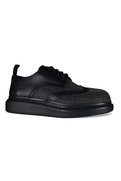 Alexander McQueen premium athletic detail and craftsmanship close-up