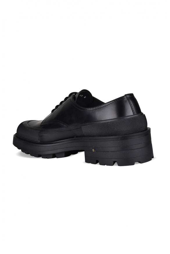 Alexander McQueen slides side profile designer luxury fashion
