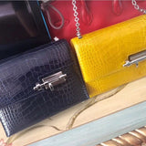Side view of understated structured handbag