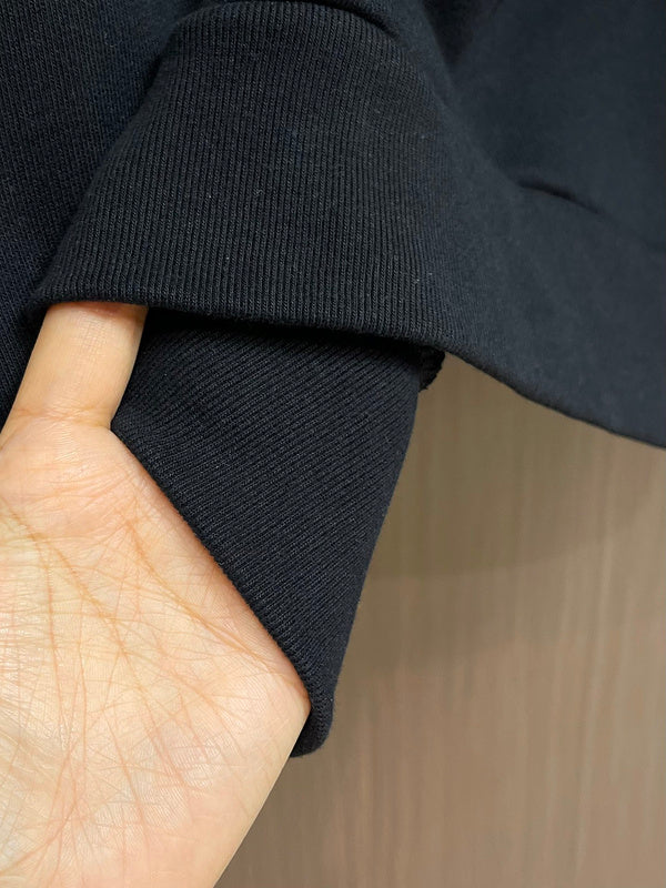 Side profile of Louis Vuitton luxury clothing with relaxed-fit cut