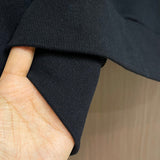 Side profile of Louis Vuitton luxury clothing with relaxed-fit cut
