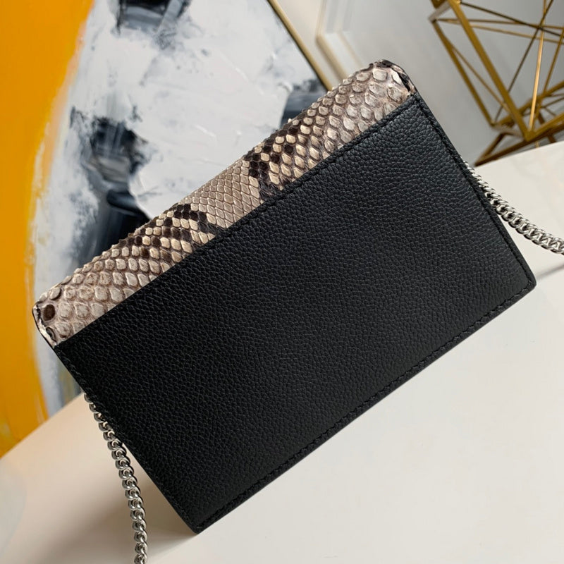 Handle and strap detail of premium refined women's handbag – women's statement bag